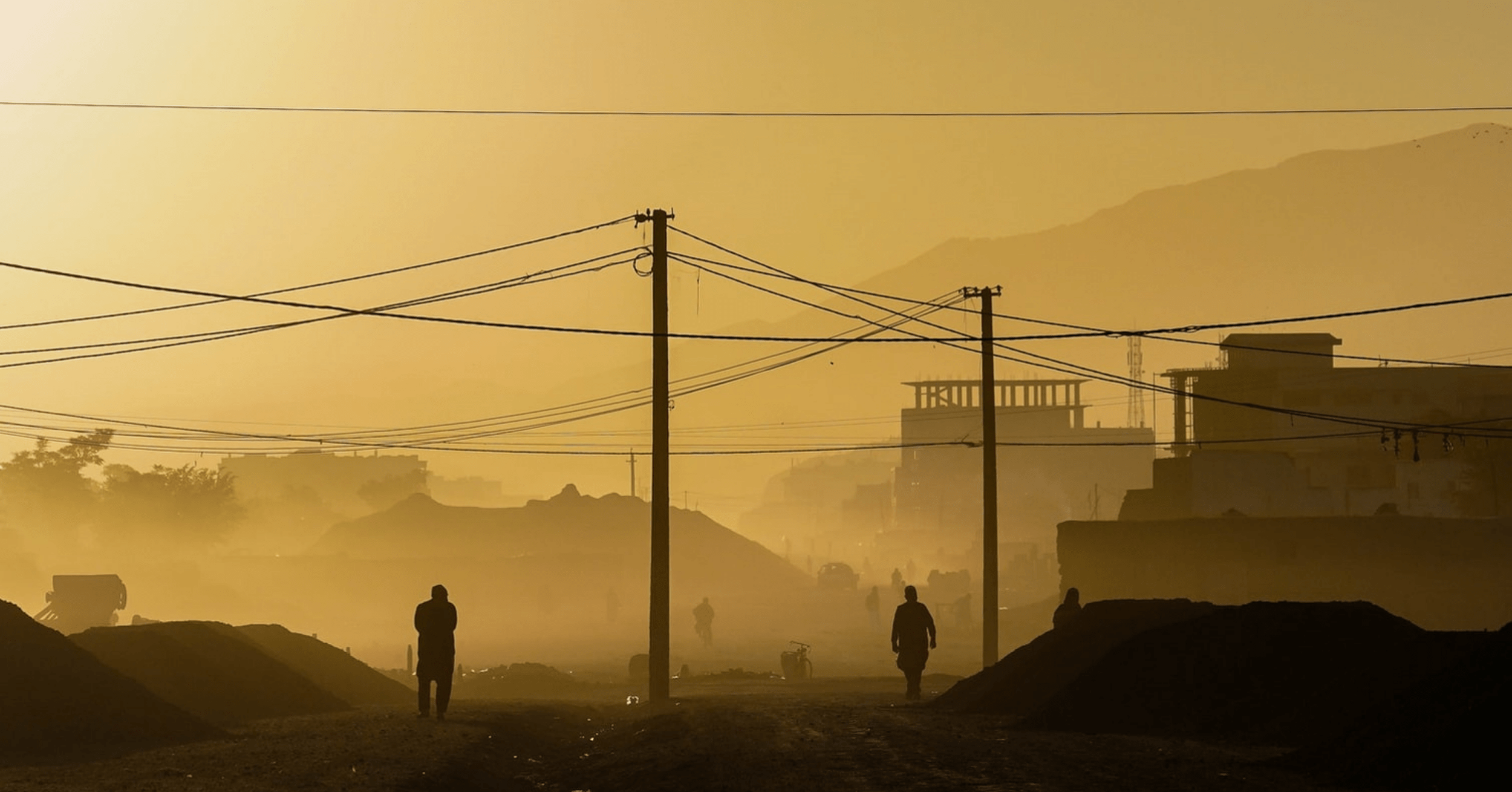 Yellow fog over Afghanistan, silhouettes